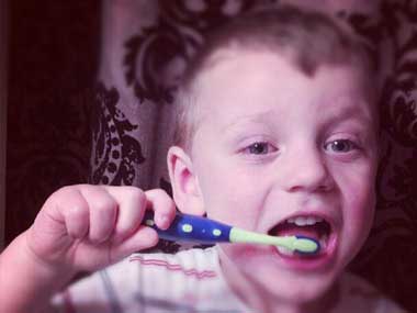 brushing your teeth the dental hygienist